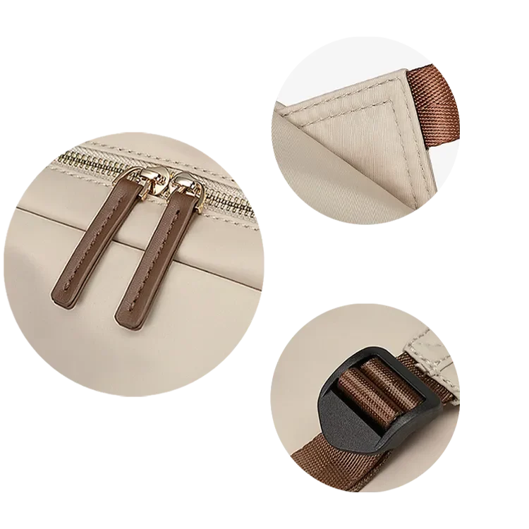 ビジネスリュック レディース用の細部クローズアップ。ベージュ素材にレザー調のダブルジッパー、しっかり縫製されたショルダーストラップの付け根と調節可能なストラップバックルが映る。