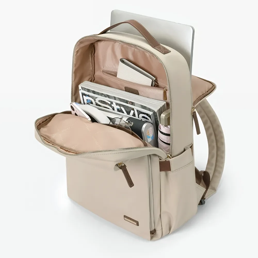 15.6インチ対応の軽量ビジネスリュックが開いている様子で、ノートパソコンや書類、小物が整理して収納されている