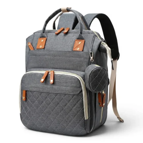 Bagagerie de maternité avec petite pochette ronde et détails marron