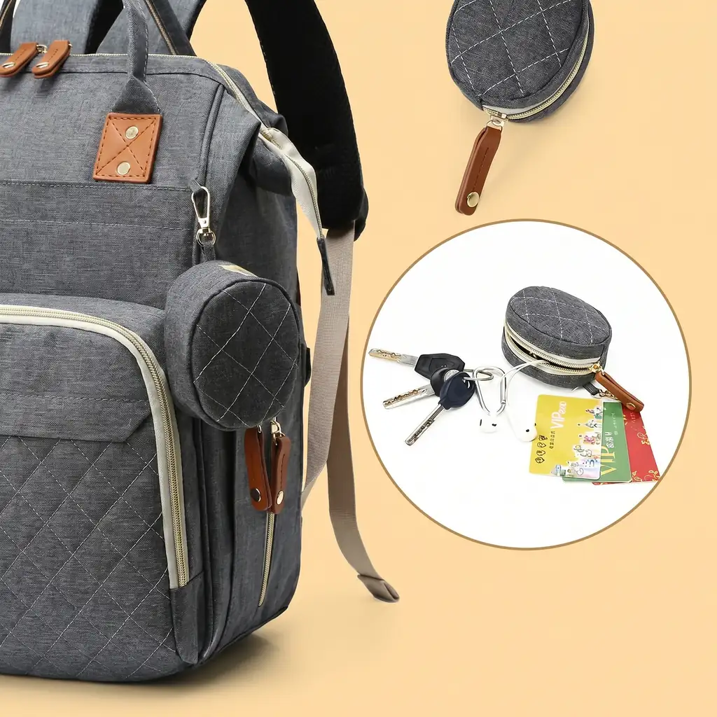 Quilted mother's backpack with cooler and detachable pouch for keys